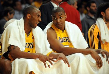 Former Lakers teammates Kobe Bryant and Andrew Bynum talk on the bench during the 2009 NBA Playoffs