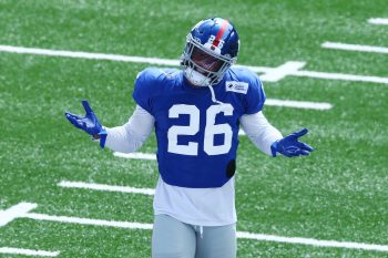 Saquon Barkley of the New York Giants looks on during the Blue and White scrimmage at MetLife Stadium on September 03, 2020 in East Rutherford, New Jersey.