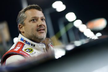 Tony Stewart stands on the grid during qualifying for the NASCAR Sprint Cup Series Ford EcoBoost 400 at Homestead-Miami Speedway on Nov. 18, 2016.