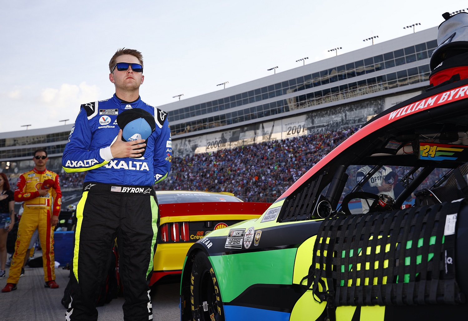 William Byron, driver of the No. 24 Chevrolet, stands on the grid during pre-race ceremonies at the NASCAR All-Star Race at Texas Motor Speedway on June 13, 2021.