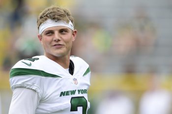 Zach Wilson of the New York Jets warms up before a preseason game against the Green Bay Packers at Lambeau Field on August 21, 2021 in Green Bay, Wisconsin. Is Zach Wilson Mormon? The answer is, yes.