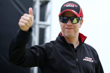 Brad Keselowski gives thumbs up to crowd