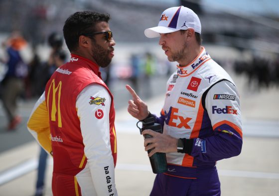 Bubba Wallace and Denny Hamlin talk on grid