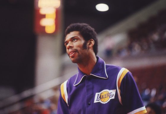 Kareem Abdul Jabbar of the Los Angeles Lakers walks on the court.