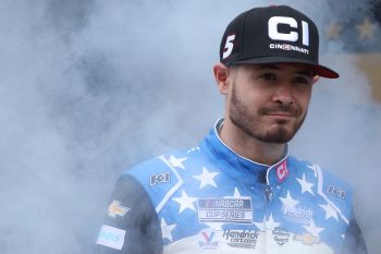 Kyle Larson walks on stage during introductions for the NASCAR Cup Series YellaWood 500 at Talladega Superspeedway on Oct. 3, 2021.