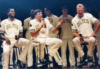 Larry Bird, right, listens to former teammates speak during Larry Bird Night.