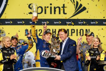 Brad Keselowski holds 2012 trophy