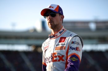 Denny Hamlin walks grid