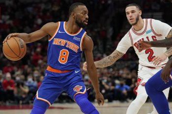 Kemba Walker of the New York Knicks dribbles the ball against Lonzo Ball of the Chicago Bulls.