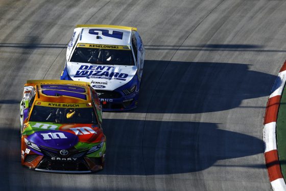 Kyle Busch and Brad Keselowski race at Martinsville