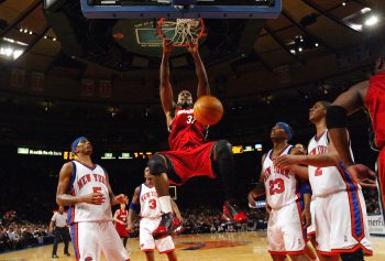 Hall of Fame center Shaquille O'Neal strikes the Dunkman pose