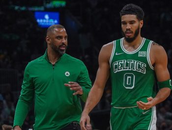 Boston Celtics head coach Ime Udoka and Boston Celtics forward Jayson Tatum chat during a timeout.