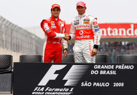 Formula 1 driver Felipe Massa, left, shakes hands with drivers' standings rival Lewis Hamilton before the 2008 Brazilian Grand Prix at the Autódromo José Carlos Pace Circuit, Interlagos, in Sao Paulo, Brazil, on Nov. 2, 2008