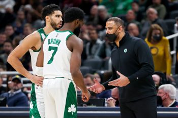 Head coach Ime Udoka of the Boston Celtics meets with Jayson Tatum and Jaylen Brown.