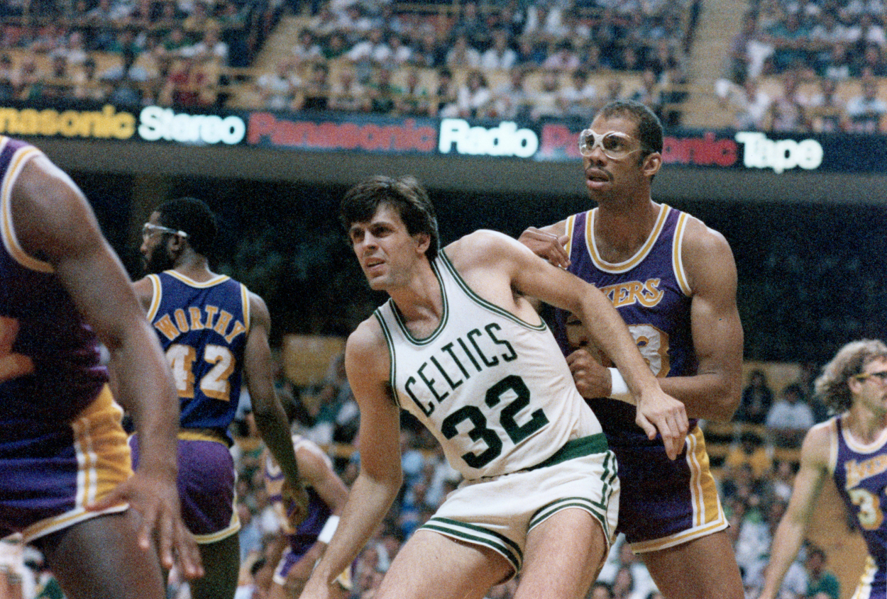 Boston Celtics Kevin McHale, left, posts up Los Angeles Lakers Kareem Abdul-Jabbar.