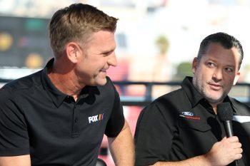 Clint Bowyer and Tony Stewart talk during press conference