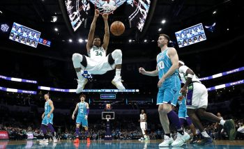 Giannis Antetokounmpo dunks the ball