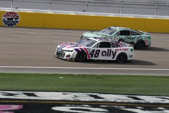 Alex Bowman races Kyle Busch