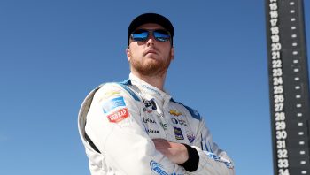 Austin Hill looks on during qualifying for the NASCAR Xfinity Series Production Alliance 300 at Auto Club Speedway on Feb. 26, 2022, in Fontana, California.