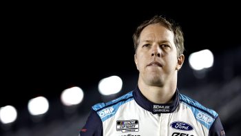 Brad Keselowski stands on the grid during qualifying for the NASCAR Cup Series Daytona 500 on Feb. 16, 2022.