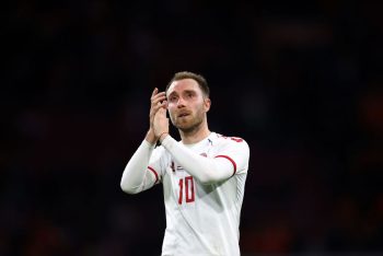 Christian Erikson applaud during a Denmark match.