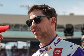 Denny Hamlin looks on before race