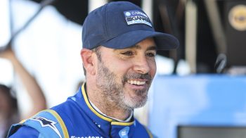 Jimmie Johnson, driver of the No. 48 Chip Ganassi Racing Honda, looks on during practice for the NTT IndyCar Series XPEL 375 at Texas Motor Speedway on March 19, 2022.