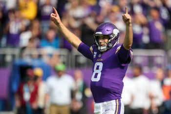 Kirk Cousins career earnings are $161 million. The QB is seen here celebrating a touchdown in 2021.