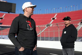 Kurt Busch and Kyle Busch walk track