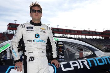 Landon Cassill waits on the grid prior to the NASCAR Xfinity Series Production Alliance 300 at Auto Club Speedway on Feb. 26, 2022, in Fontana, California.