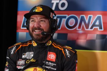 Martin Truex Jr. speaks to reporters during the NASCAR Cup Series Daytona 500 Media Day at Daytona International Speedway on Feb. 16, 2022.