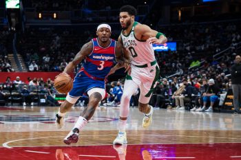 Bradley Beal of the Washington Wizards drives to the basket against Jayson Tatum of the Boston Celtics.