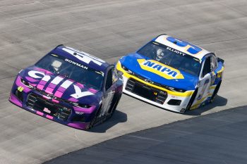 Hendrick Motorsports teammates Alex Bowman and Chase Elliott battle at Dover Motor Speedway in 2021