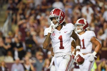 Alabama Crimson Tide wide receiver Jameson Williams hushes the crowd in 2021. Todd McShay predicts a trade between the Chiefs and the Chargers trade picks in the NFL draft so KC can draft the WR.