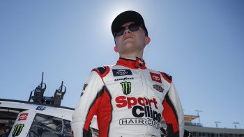 Ty Gibbs waits on the grid during ceremonies prior to the NASCAR Xfinity Series United Rentals 200 at Phoenix Raceway on March 12, 2022.