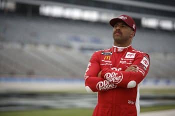 Bubba Wallace looks on grid