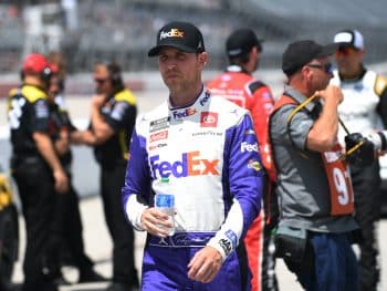 Denny Hamlin walks on grid