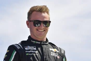 Justin Haley walks onstage during driver intros prior to the NASCAR Cup Series Echopark Automotive Grand Prix at Circuit of The Americas on March 27, 2022.