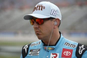 Kyle Busch walks before practice