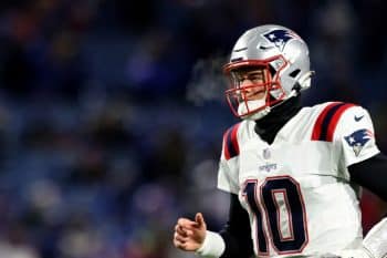 Mac Jones of the New England Patriots warms up prior to a game against the Buffalo Bills.