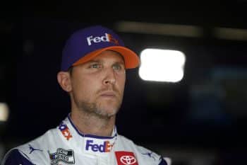 Denny Hamlin waits for practice