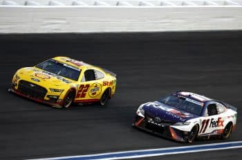 Denny Hamlin and Joey Logano race