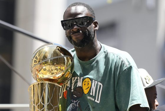 Draymond Green celebrates during the Warriors' championship parade.