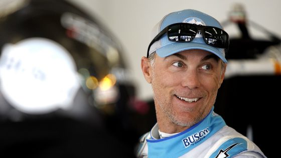 Kevin Harvick waits in the garage area during practice for the NASCAR Cup Series Daytona 500 on Feb. 19, 2022.