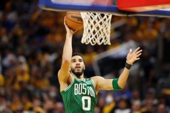 Jayson Tatum of the Boston Celtics shoots the ball against the Golden State Warriors.