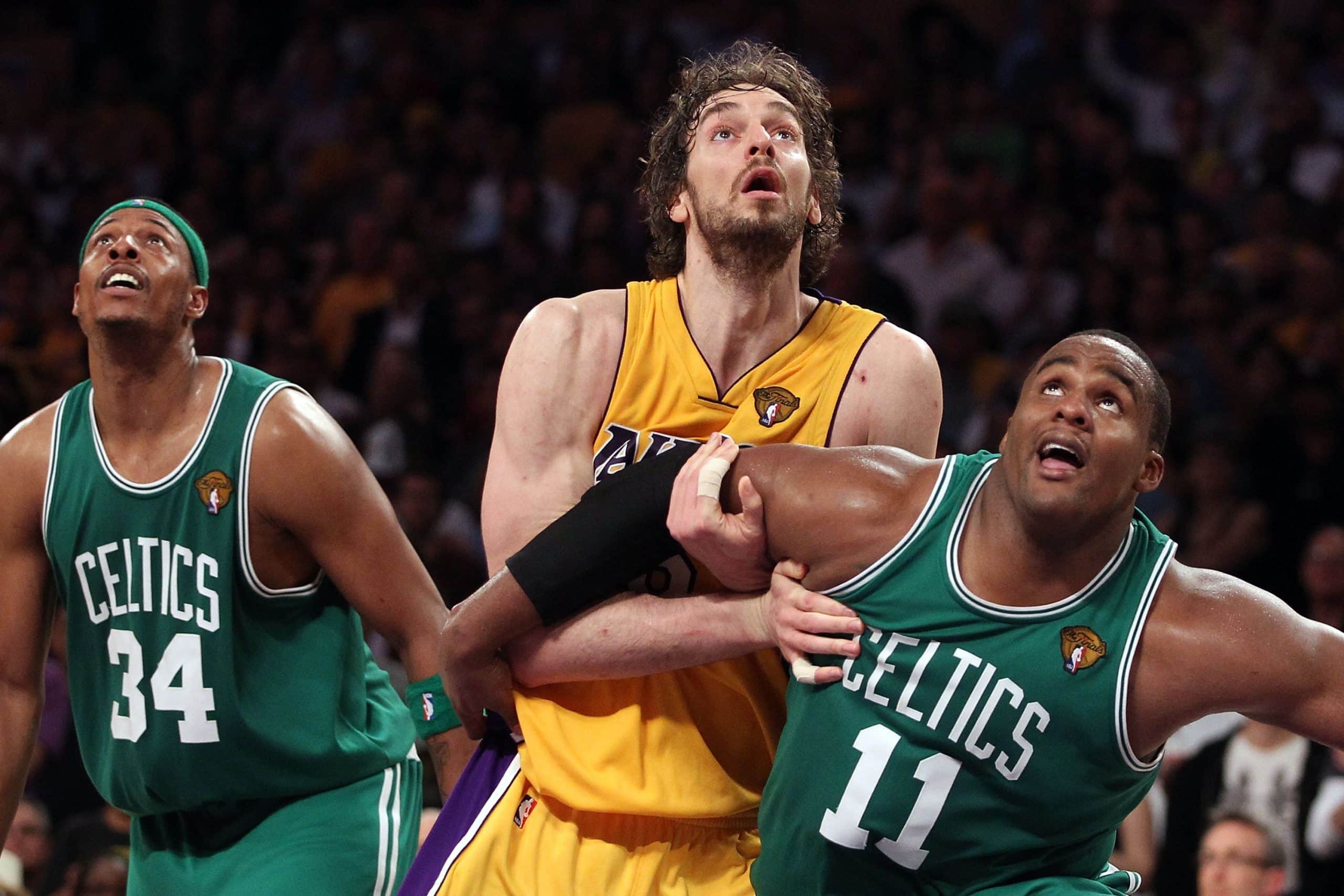 Glen Davis #11 and Paul Pierce #34 of the Boston Celtics box out Pau Gasol #16 of the Los Angeles Lakers.