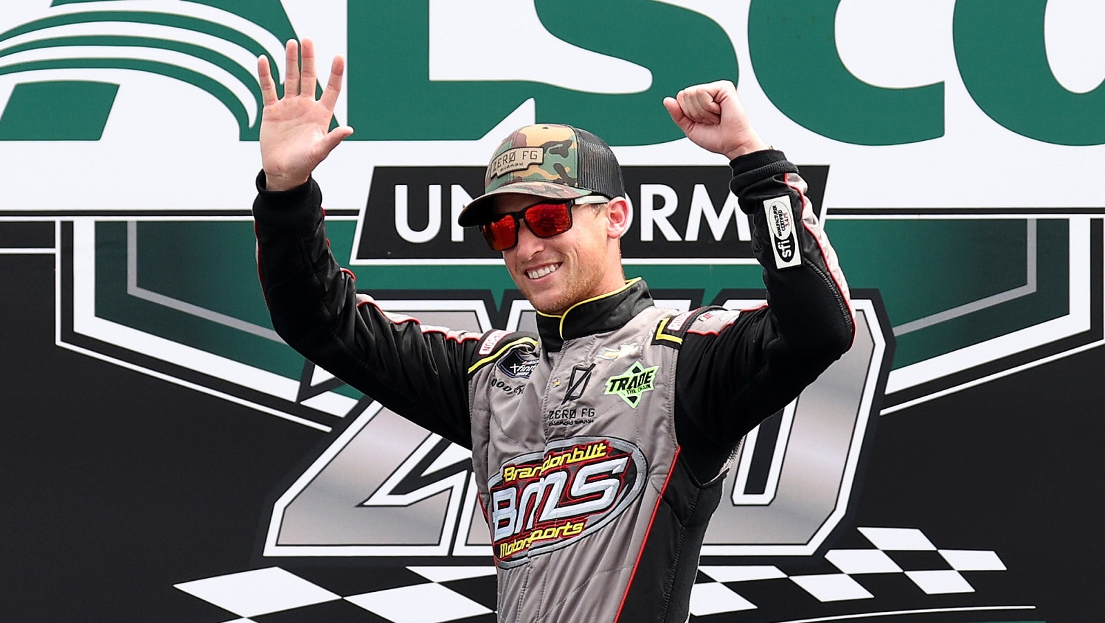 Brandon Brown waves to fans during driver introductions for the NASCAR Xfinity Series Alsco Uniforms 250 at Atlanta Motor Speedway on July 9, 2022. | James Gilbert/Getty Images