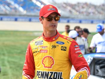 Joey Logano walks grid