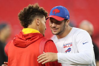 Patrick Mahomes and Josh Allen hug.