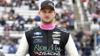 Sage Karam walks on stage during ceremonies prior to the NASCAR Camping World Truck Series United Rentals 200 at Martinsville Speedway on Oct. 30, 2021.